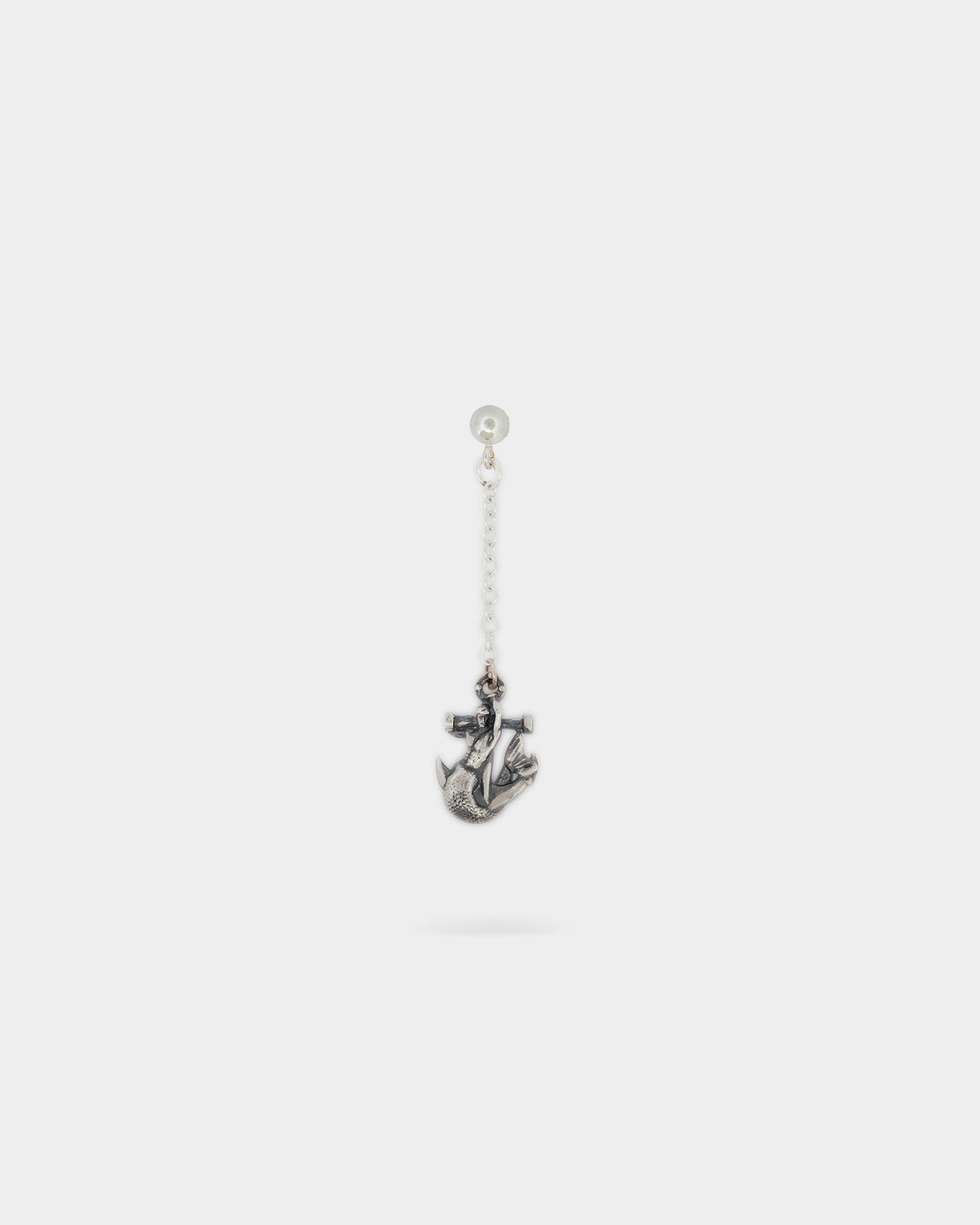 Merman & Anchor Single Earring in Sterling Silver by Wilson Grant