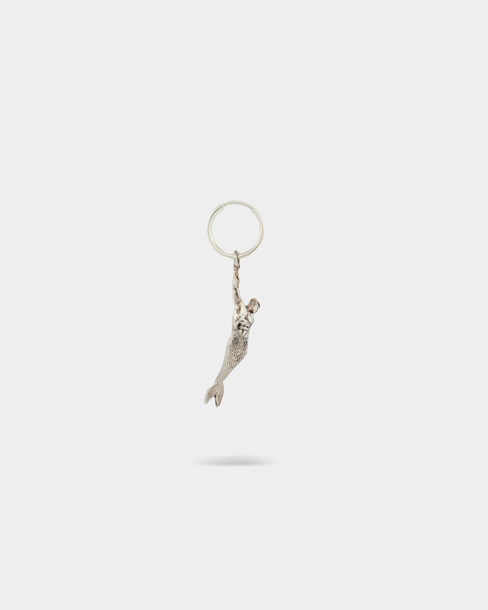 Hanging Merman Single Earring in Sterling Silver by Wilson Grant